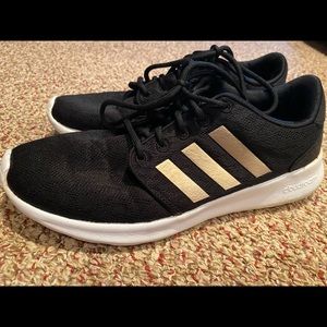 Adidas size 8 women’s shoe. Black, white and tan.